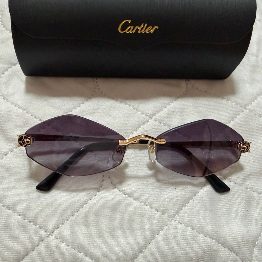Cartier Women's Rimless Sunglasses with Purple Lenses and Gold Accent